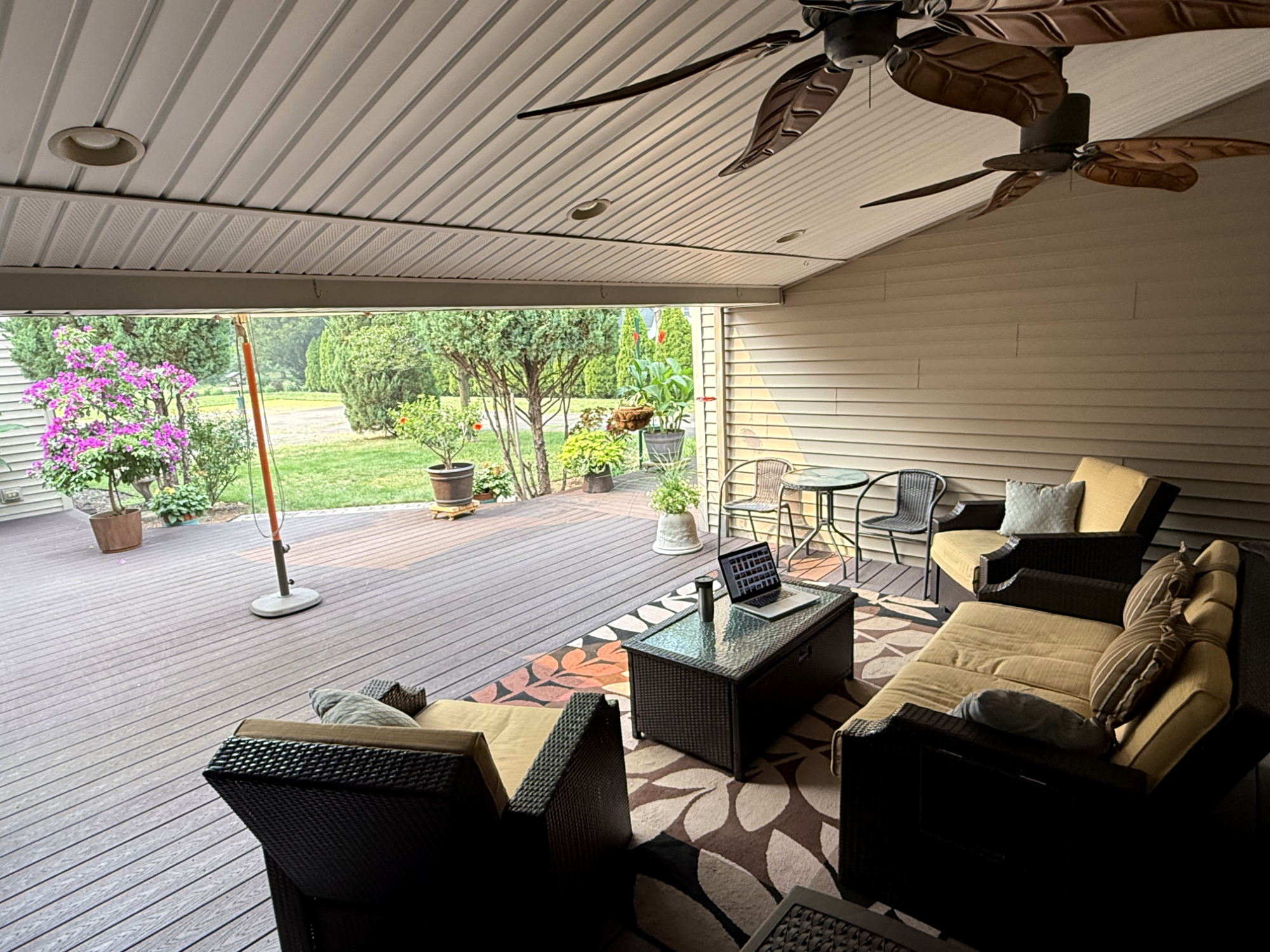 Covered outdoor deck seating area for relaxing, reading, or enjoying fresh air